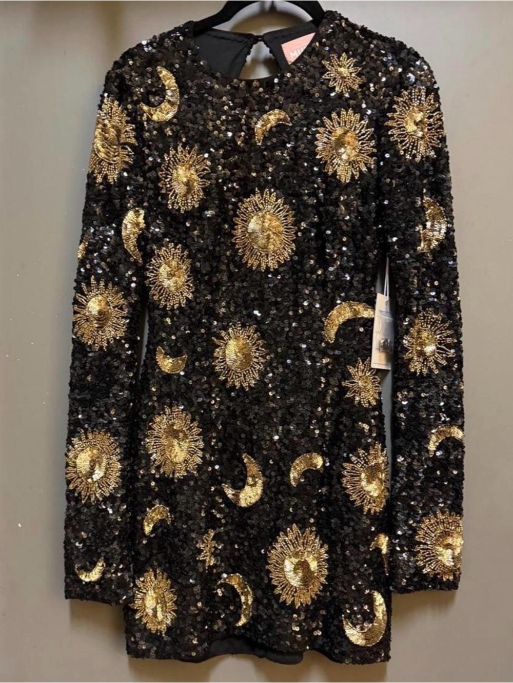 Show Me Your MuMu Black Sequin Mini Dress with Gold Sunburst Motif
